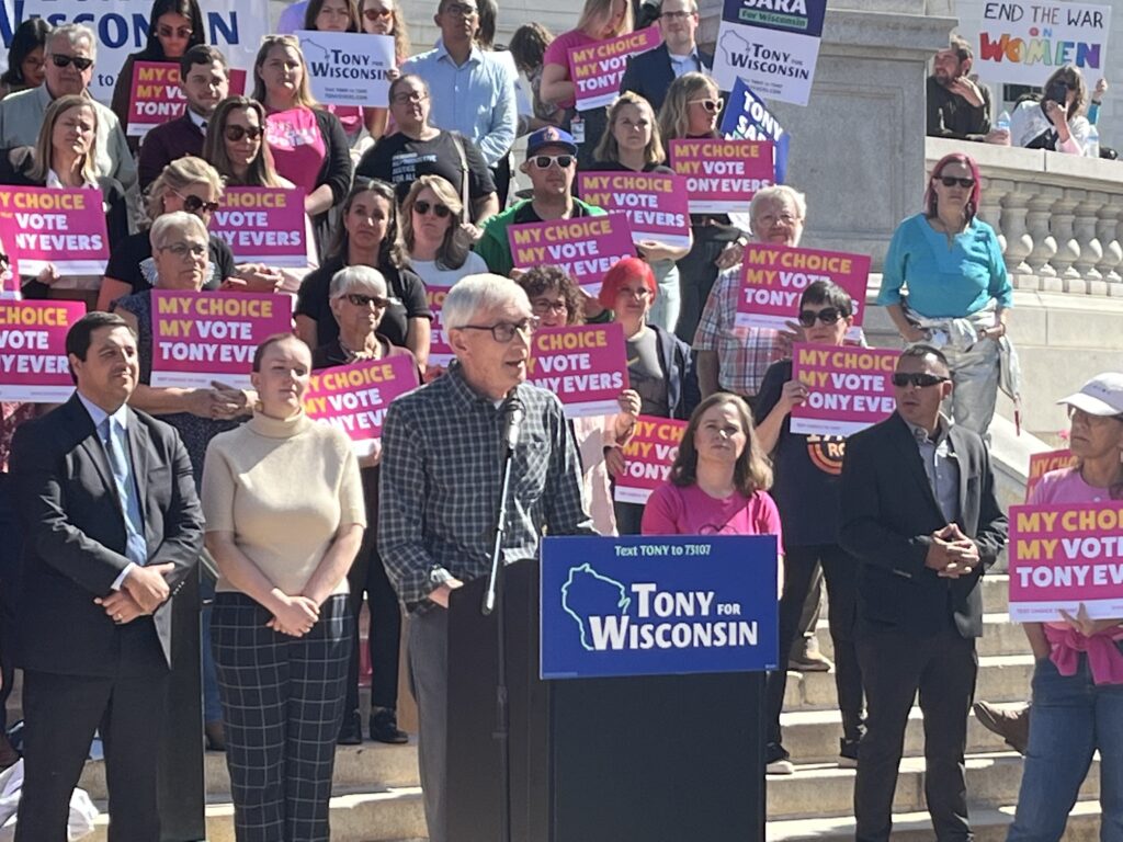 Wisconsin Gov. Tony Evers addresses a rally at the Capitol after Republicans gaveled in and out of his special session on creating a referendum process so voters could amend Wisconsin's 1849 abortion ban. The Reproductive Freedom Alliance comprises Democratic governors from 20 states that aim to protect abortion and reproductive health care access. Wisconsin Examiner file photo.