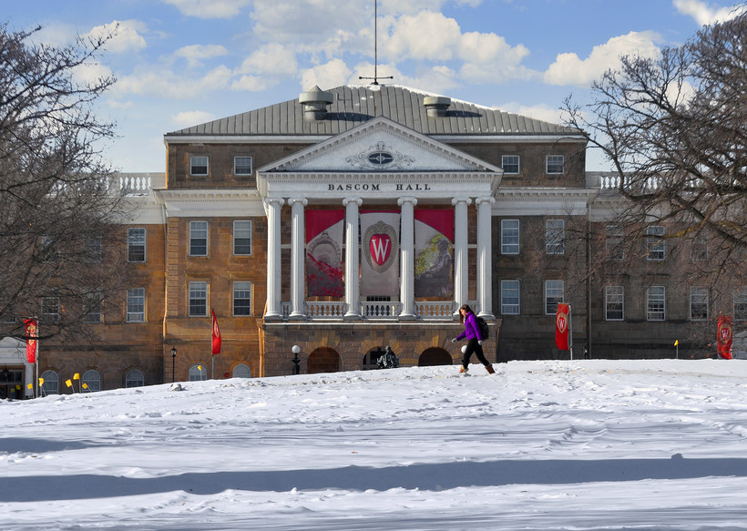 A student walks in front of Bascom Hall on the UW-Madison campus. Richard Hurd