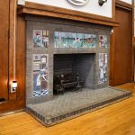 Tile Town: Century-Old Illustrated Fireplace Delights Students
