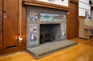 The brick and tiled fireplace at Riley Montessori. Photo by Ben Tyjeski.