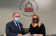 Attorney Jim Troupis presenting the recount petition to Meagan Wolfe. Photo from the WEC.