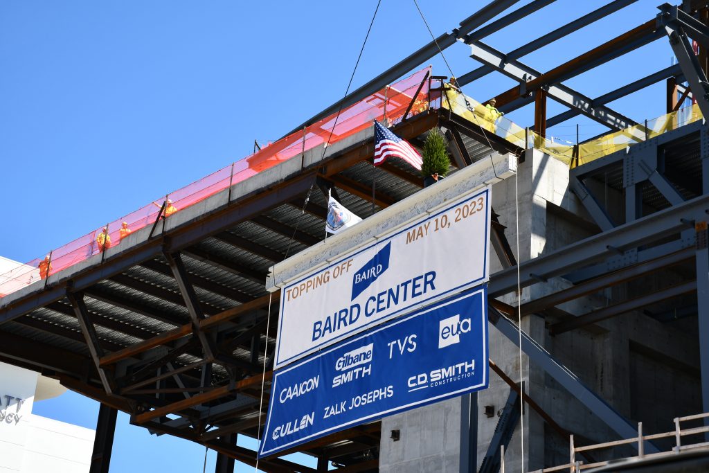 Topping off beam lifted to the top of the future Baird Center. Photo by Jeramey Jannene.