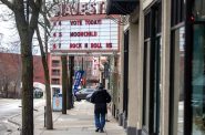 A sign outside of Majestic Theatre encourages voting Tuesday, April 4, 2023, in Madison, Wis. Angela Major/WPR