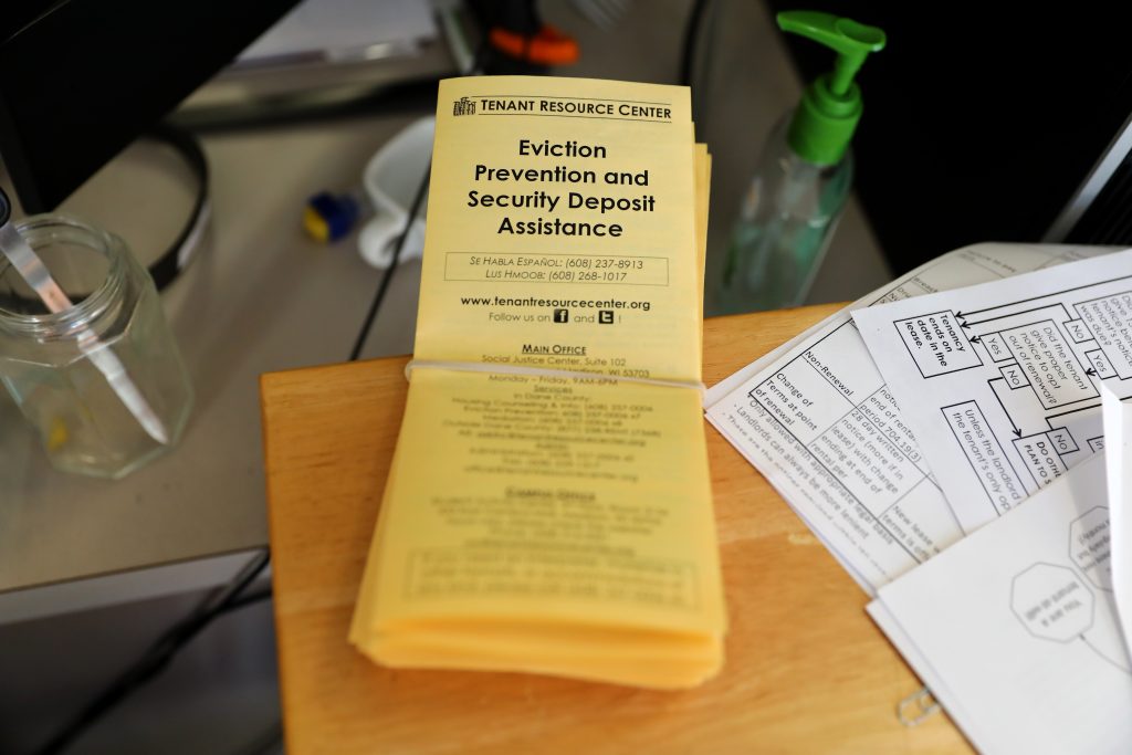 Pamphlets with information about eviction prevention and other assistance for renters are seen in 2017 at the Madison, Wis., office of the Tenant Resource Center. When tenants face an eviction, housing advocates suggest they talk to their landlords, apply for rental assistance and find legal support. (Coburn Dukehart / Wisconsin Watch)