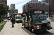Food trucks parked on N. Water St. near Red Arrow Park as part of the former Food Truck Friday event. Photo by Dave Reid.