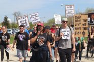 Protesters gather in Wauwatosa to speak out against the protester list made in 2020 by Wauwatosa PD, and new policies on the horizon for Milwaukee. Photo by Isiah Holmes/Wisconsin Examiner.