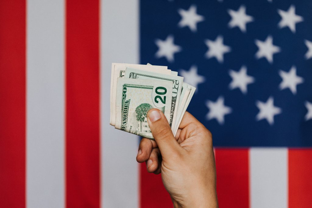 U.S Flag and money. (Pexels liscense)