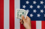 U.S Flag and money. (Pexels liscense)