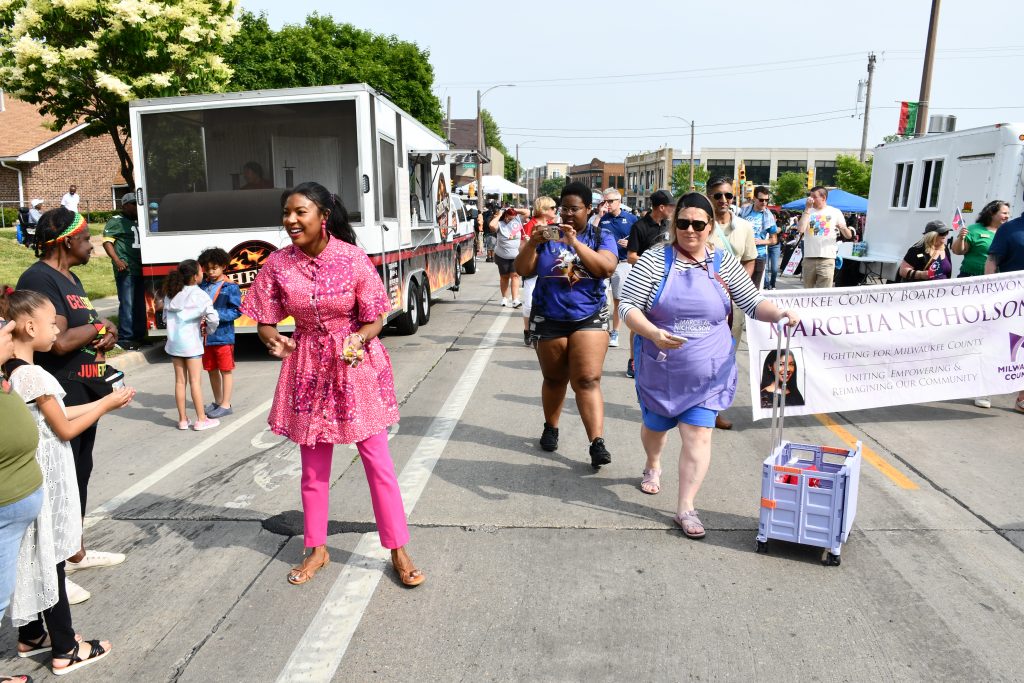 Milwaukee County Board Chairwoman Marcelia Nicholson hands out candy during the 2023 Juneteenth Parade. Photo by Jeramey Jannene.