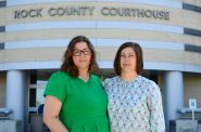 Jamie Gaffke, left, and her wife, Ruth Vater, went to the Rock County Courthouse in Janesville, Wis., in 2014 to secure both of their parental rights for their first son. Because of a lack of updated state laws, same-sex parents in Wisconsin worry their parental rights won’t be honored by future court or administrative decisions. (Joey Prestley / Wisconsin Watch)