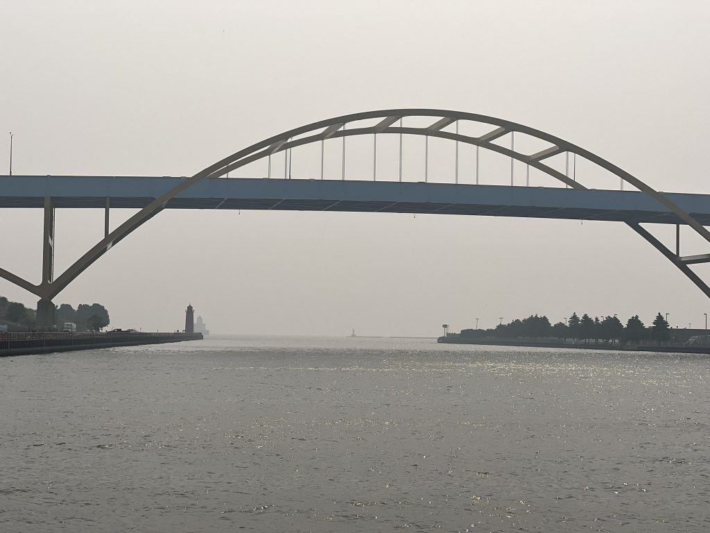 The Hoan Bridge and Lake Michigan becoming hidden by smog. Photo by Jeramey Jannene.