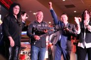 Gene Simmons (left), James A. Crawford, Dominic Ortiz and Paul Stanley at the ribbon-cutting. Photo taken July 1, 2023 by Sophie Bolich.