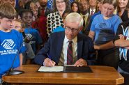 Gov. Tony Evers signed the 2023-25 budget bill with 51 partial vetoes on July 5, 2023. (Baylor Spears | Wisconsin Examiner)