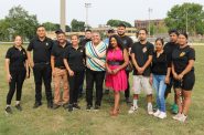 Alderwoman JoCasta Zamarripa stands with food truck operators at a press conference. Photo taken Aug. 9, 2023 by Sophie Bolich.