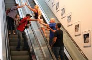 Riders high five each other on the Polka Time! escalator. Photo taken Aug. 18, 2023 by Sophie Bolich.