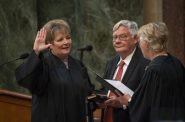 Justice Protasiewicz Investiture – left to right Justice Protasiewicz, Husband Greg Sell, Justice Ann Walsh Bradley. Wisconsin Examiner file photo