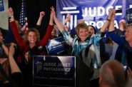 Justice Janet Protasiewicz, center, celebrates her victory on election night on April 4, 2023, with Justices Rebecca Dallet, left, Jill Karofsky, far left, and Ann Walsh Bradley, far right. The liberal majority has moved quickly to assert its control over the court. (Drake White-Bergey / Wisconsin Watch)