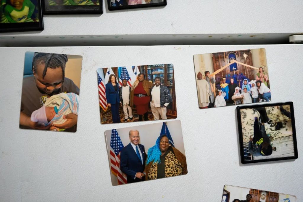 Family photos cover the refrigerator of the Branch family kitchen on July 1, 2023, in Milwaukee. Deanna Branch spotlighted lead hazards as a guest during President Joe Biden’s 2023 State of the Union address, and she previously met Vice President Kamala Harris in 2022 when the Democrat visited Milwaukee to promote federal spending on water projects. (Sara Stathas for Wisconsin Watch)