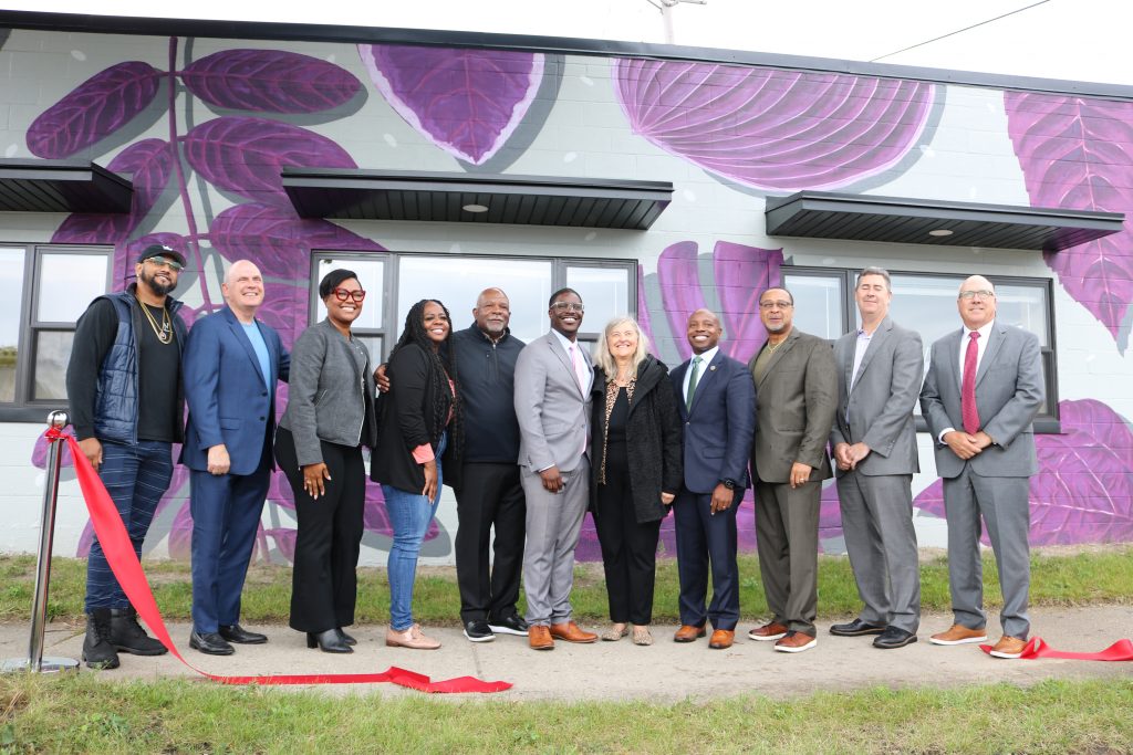 City and community leaders cut the ribbon at the grand opening for The Connector Building, 274 E. Keefe Ave. Photo taken Sept. 19, 2023 by Sophie Bolich.
