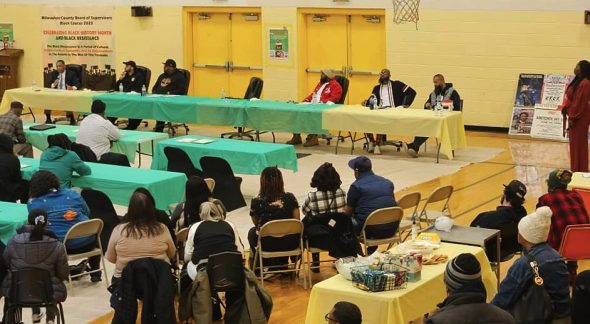 Panelists, including Milwaukee County Circuit Judge Milton Childs and Edward Hennings, address the crowd at a “Re-entry Unblemished” event on March 22 at Northcott Neighborhood House. (Photo by Chandra Staples provided by the Office of County Supervisor Sequanna Taylor) 