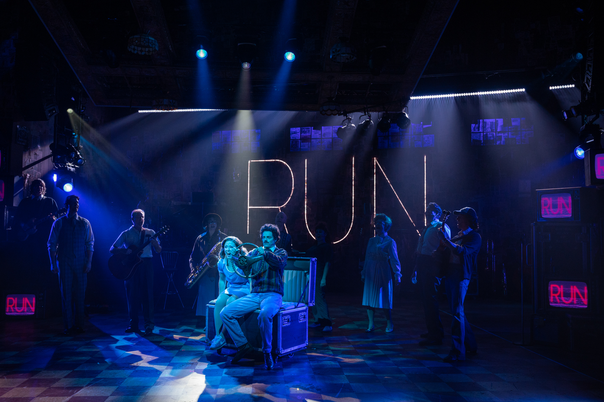 Milwaukee Repertory Theater presents Run Bambi Run in the Quadracci Powerhouse September 14 – October 22, 2023. Pictured: Erika Olson, Ian Littleworth and cast. Photo by Michael Brosilow.