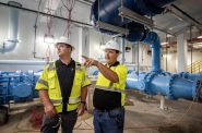 General manager of Waukesha's Water Utility Dan Duchniak, left, walks around the facility with Jeff Champion, a construction manager with Black & Veatch, right, on Tuesday, Aug. 29, 2023, in Waukesha, Wis. Angela Major/WPR