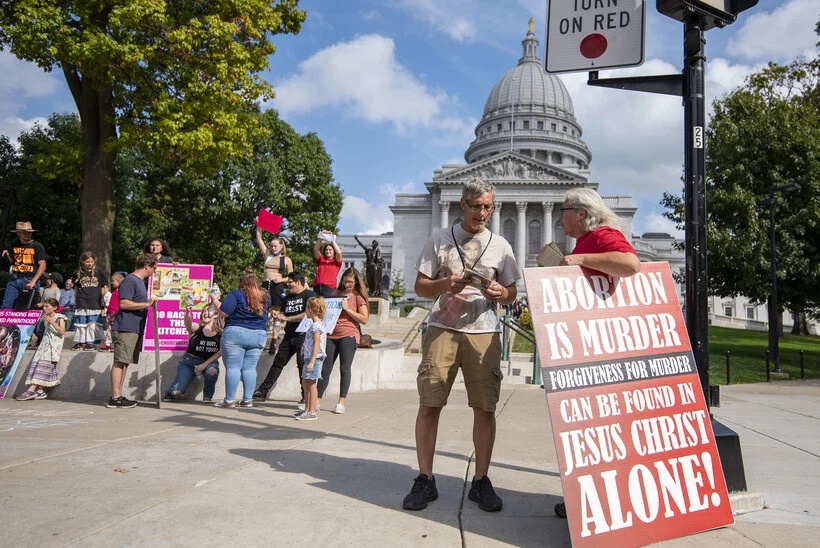 Pro-life protesters gather and chant in opposition to the pro-choice march Saturday, Oct. 2, 2021, in downtown Madison, Wis. Angela Major/WPR