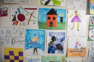 Art that second-grader L.B. created during virtual school is hung on the wall at her home Thursday, March 17, 2022. Angela Major/WPR