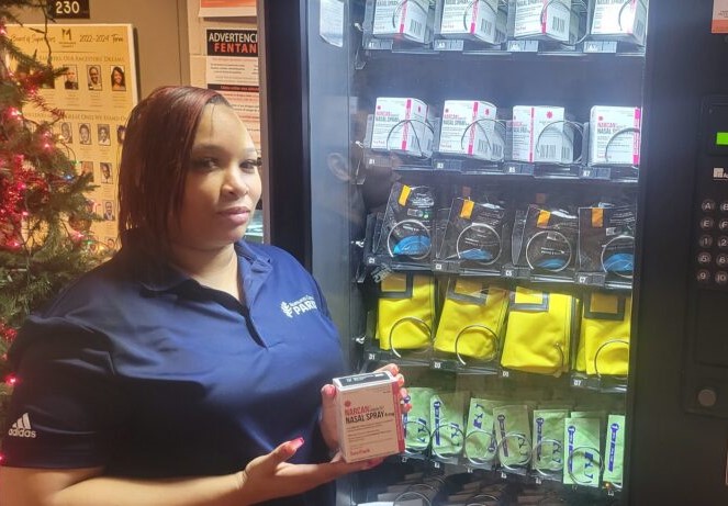 Shanice Collins, 34, secured Narcan from this Harm Reduction Vending Machine during a drug overdose emergency earlier this month at the Martin Luther King Jr. Community Center. (Photo by Edgar Mendez)