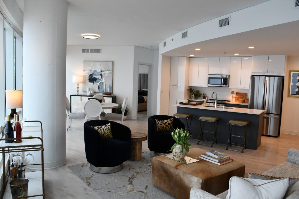 Living room and kitchen in a two-bedroom unit at The Couture. Photo by Jeramey Jannene.