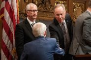 Assembly Speaker Robin Vos, right, shakes hands with Gov. Tony Evers before the State of the State address Tuesday, Jan. 23, 2024, at the Wisconsin State Capitol in Madison, Wis. (Angela Major/WPR)