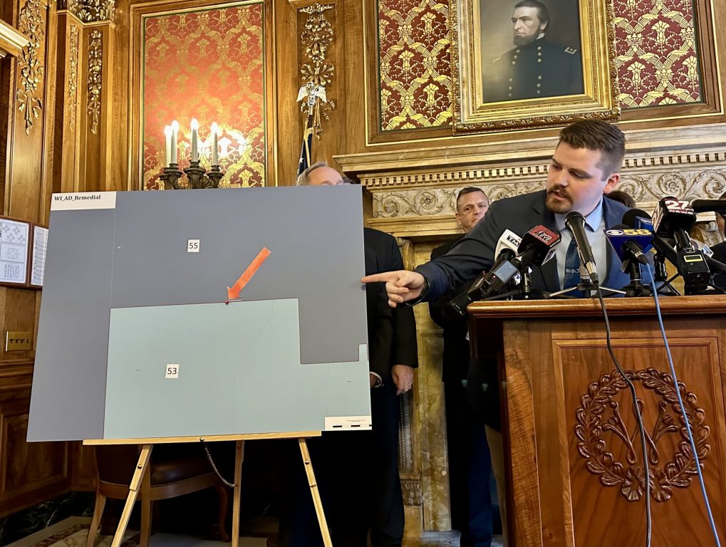 Nate Gustafson, R-Fox Crossing, demonstrates that his home is no longer in the district he has represented under legislative maps proposed by Gov. Tony Evers, at a press conference in the Wisconsin State Capitol in Madison on Wednesday, Jan. 24. Anya van Wagtendonk/WPR
