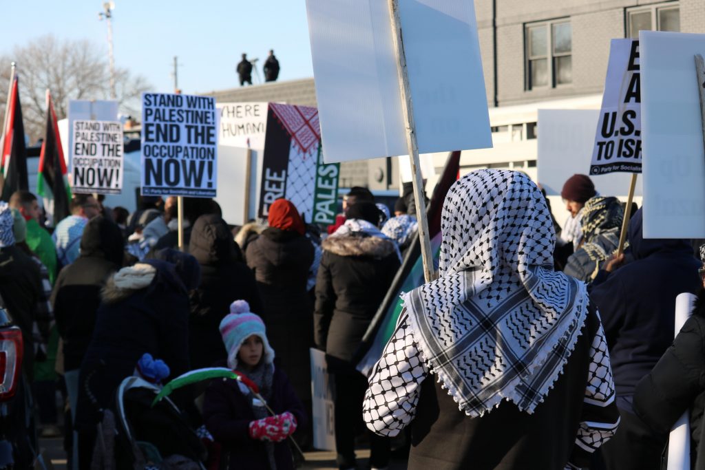 Pro-Palestine protesters gather outside of the Wisconsin Black Chamber of Commerce on Dec. 20, 2023. Photo by Sophie Bolich.
