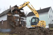 Demolition of a city-owned home at 3347 N. 26th St. Photo by Jeramey Jannene.
