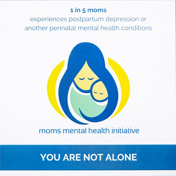 A poster in Sarah Bloomquist’s office offers support to moms with postpartum depression. (Sara Stathas for Wisconsin Watch)