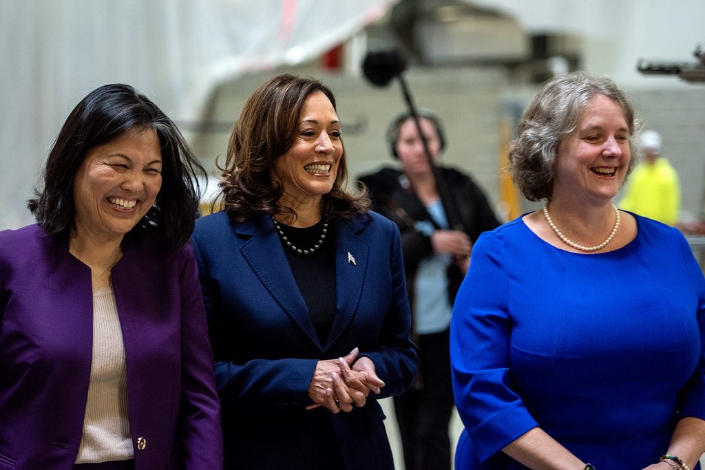 Vice President Kamala Harris, center, Acting Secretary of Labor Julie Su, left, and Madison Mayor Satya Rhodes-Conway, right, walk together Wednesday, March 6, 2024, during a visit to Madison, Wis. (Angela Major/WPR)