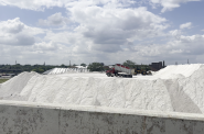 Port Milwaukee leases space used by three vendors who stockpile mountains of road salt like this one seen in August 2023. Photo by Kareem Benson-White.