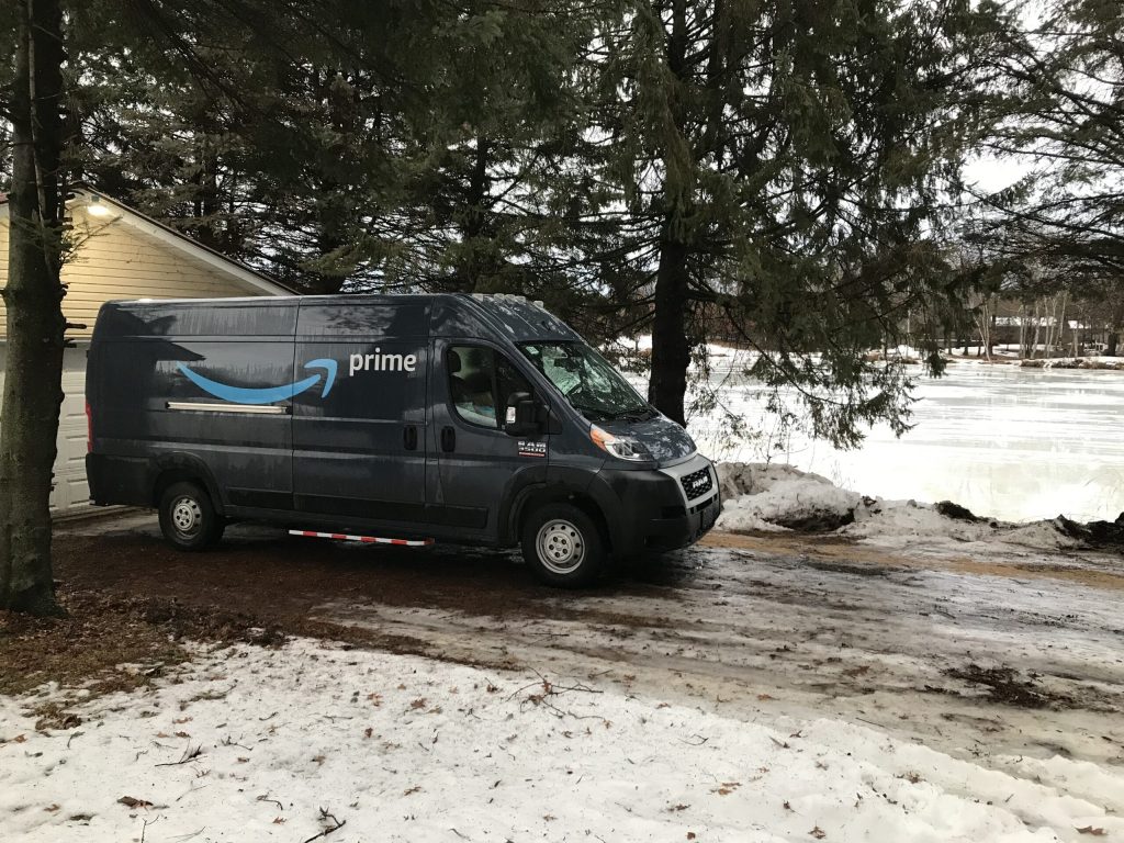 A delivery truck sits stranded at the base of Patti See’s icy driveway on Lake Hallie (photo courtesy of Patti See)