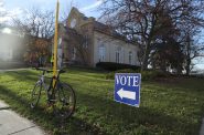 A sign directs voters on Election Day on Nov. 8, 2022, to a polling location inside the Gates of Heaven synagogue in Madison, Wis. Voters on Tuesday will decide on two constitutional amendments affecting election administration. (Amona Saleh / Wisconsin Watch)