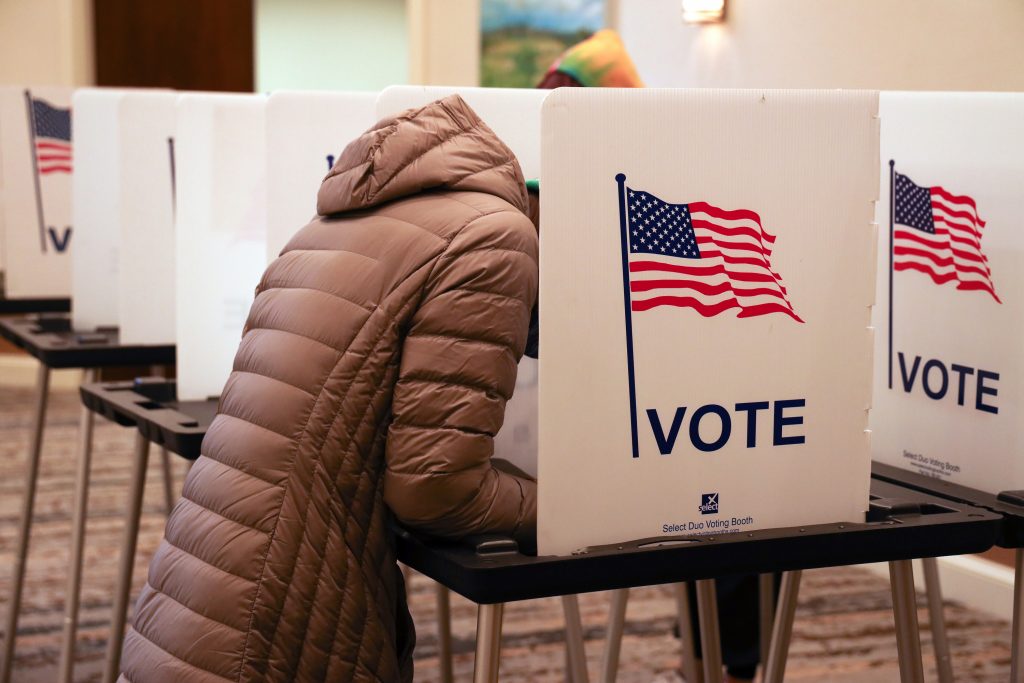 Only election officials could perform election-related tasks under a constitutional amendment up for a vote Tuesday. Election officials are questioning whether that applies to private companies that print ballots or service voting equipment. (Amona Saleh / Wisconsin Watch)