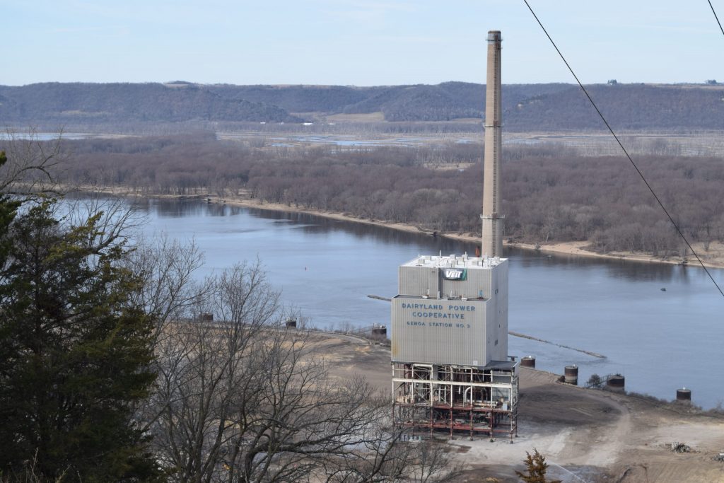 The boiler house and chimney stack at the Genoa power plant prior to demolition on Tuesday, March 19, 2024. Work to demolish the site began three years ago. Hope Kirwan/WPR