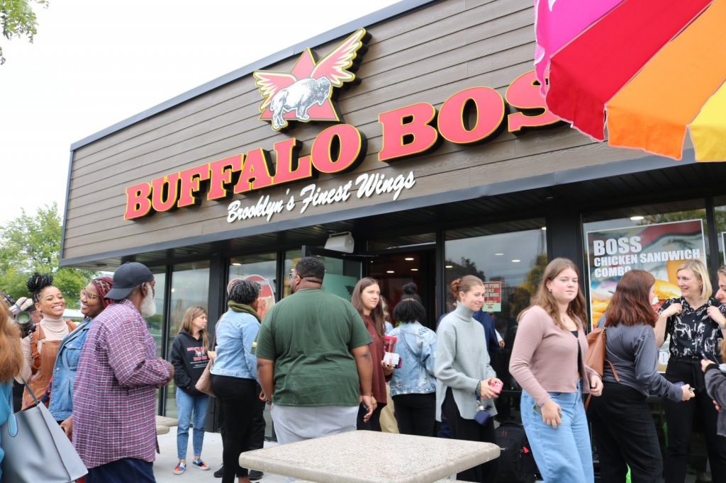 Guests at the grand opening of Buffalo Boss. Photo taken September 2023 by Sophie Bolich.