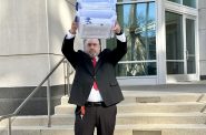 Matt Snorek delivers petitions aimed at recalling Assembly Speaker Robin Vos, R-Rochester, at the Wisconsin Elections Commission, in Madison, Wis., on March 11, 2024 Anya van Wagtendonk/WPR