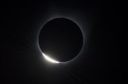 The Diamond Ring effect is seen as the moon makes its final move over the sun during the total solar eclipse on Monday, August 21, 2017 above Madras, Oregon. A total solar eclipse swept across a narrow portion of the contiguous United States from Lincoln Beach, Oregon to Charleston, South Carolina. A partial solar eclipse was visible across the entire North American continent along with parts of South America, Africa, and Europe. Aubrey Gemignani/NASA