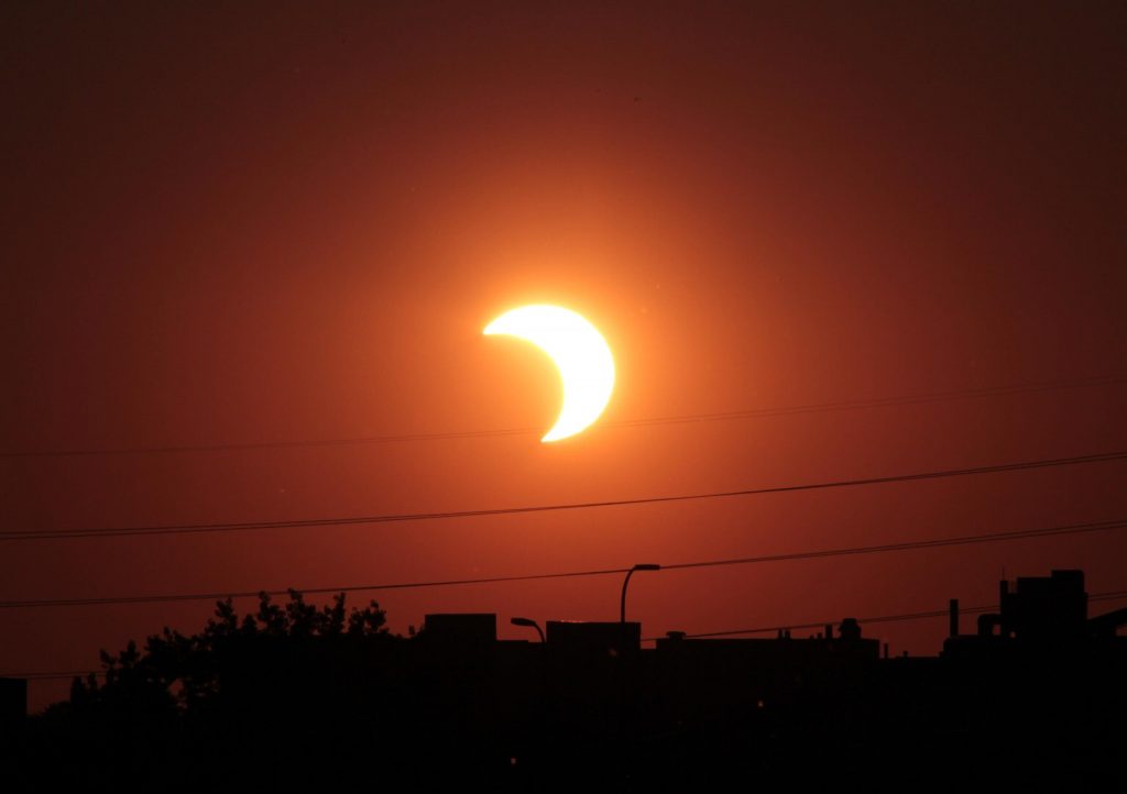 A partial solar eclipse in Minneapolis, MN on May 20, 2012 Public domain