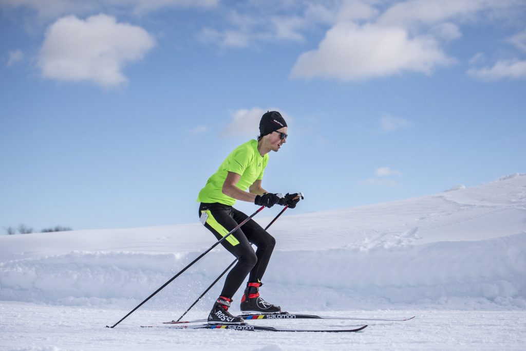 A cross-country skier moves across the snow on a sunny day Monday, Dec. 21, 2020, at Elver Park in Madison, Wis. Angela Major/WPR