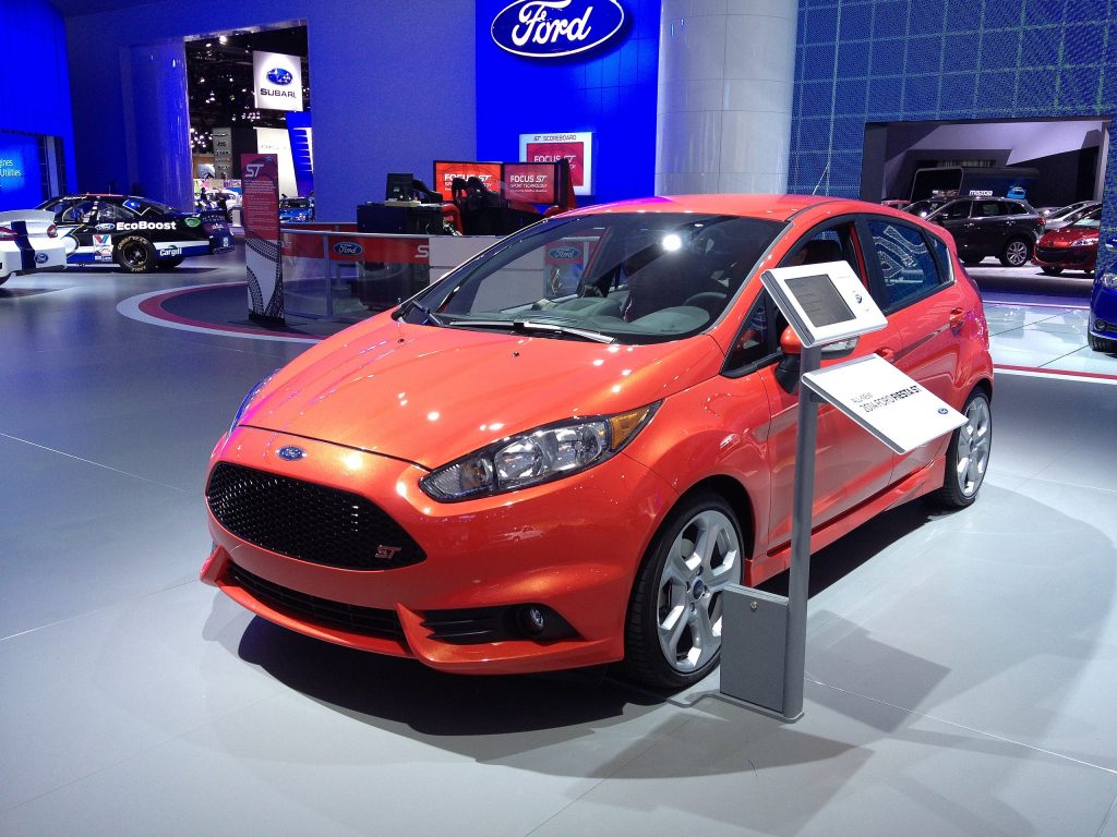 2014 Ford Fiesta ST. Photo by Sarah Larson from Ann Arbor, MI, USA, CC BY 2.0 <https://creativecommons.org/licenses/by/2.0>, via Wikimedia Commons