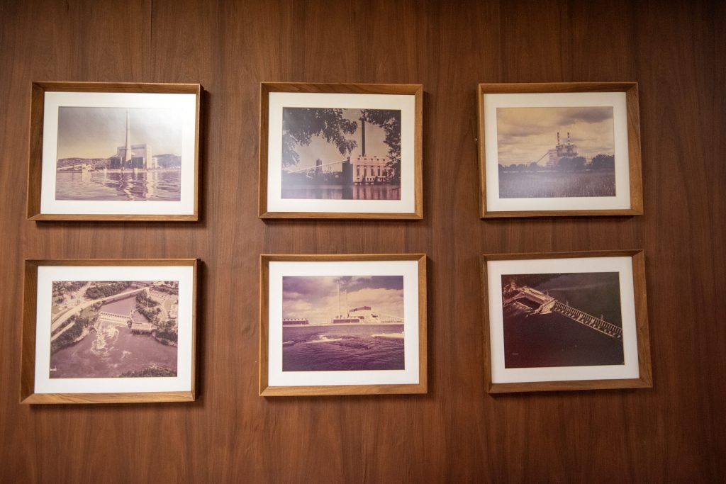 Historical photographs of the facility are hung on the wall Tuesday, Jan. 30, 2024, at the Edgewater Generating Station in Sheboygan, Wis. Angela Major/WPR