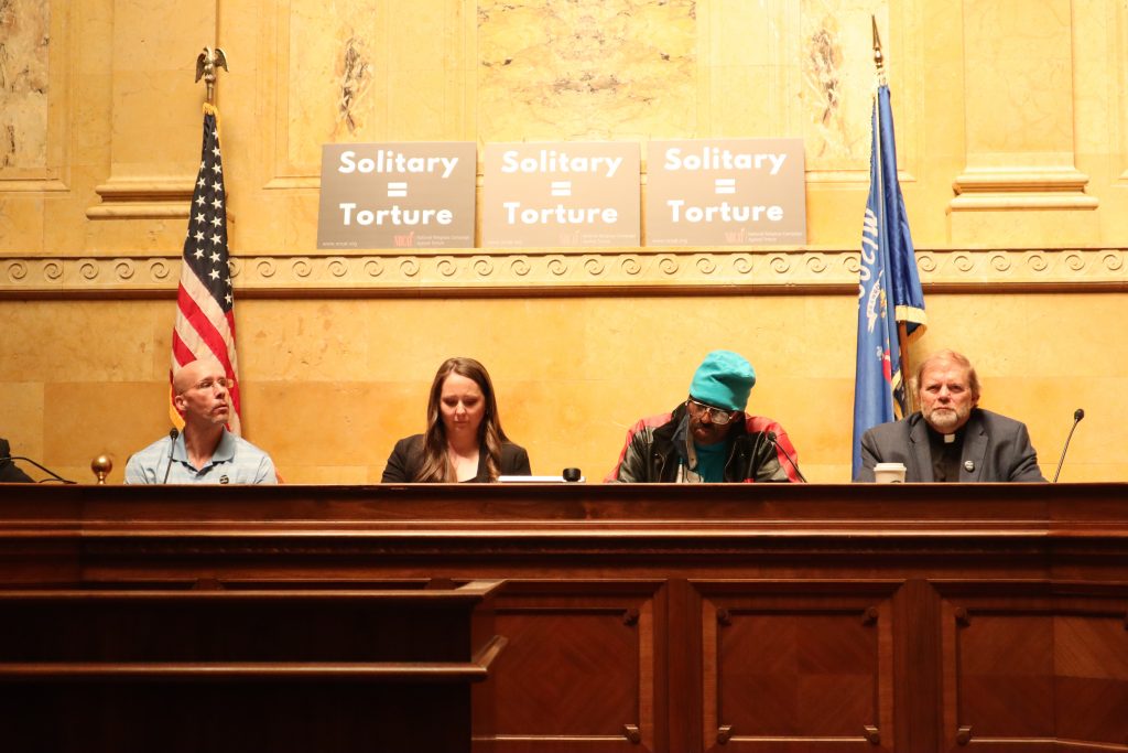 Panelists during a day of action at the Capitol call for an end to solitary confinement. (Photo | Isiah Holmes)