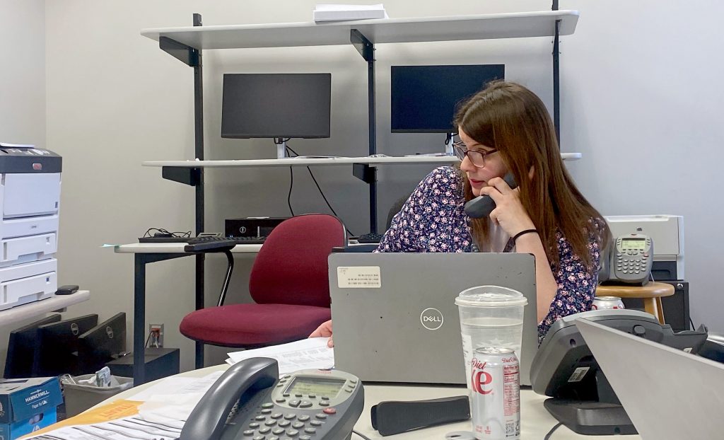 Claire Woodall, Milwaukee’s chief election official, works from the Milwaukee Election Commission office on April 2, 2024, at City Hall in Milwaukee. Woodall has implemented a 26-point checklist to ensure missteps from the 2020 election aren’t repeated. (Alexander Shur / Votebeat)